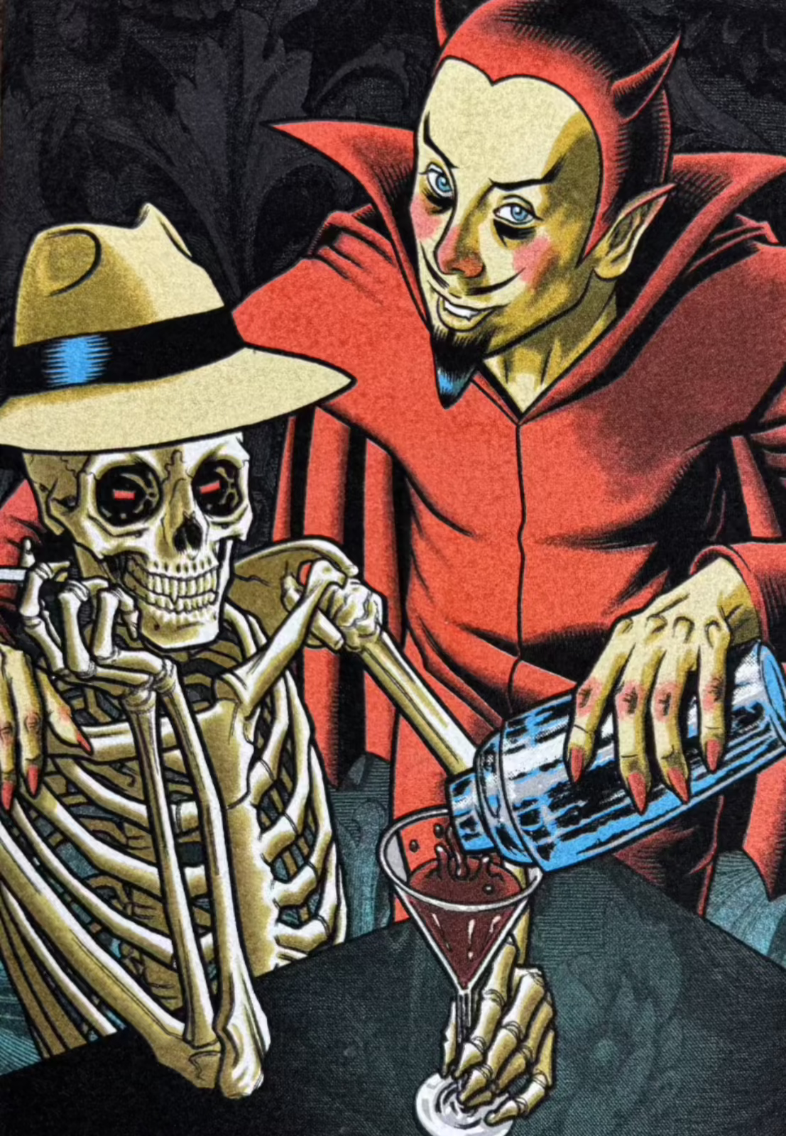 Side view of merch flat lay: tee, hoodie, hat, and promo accessories