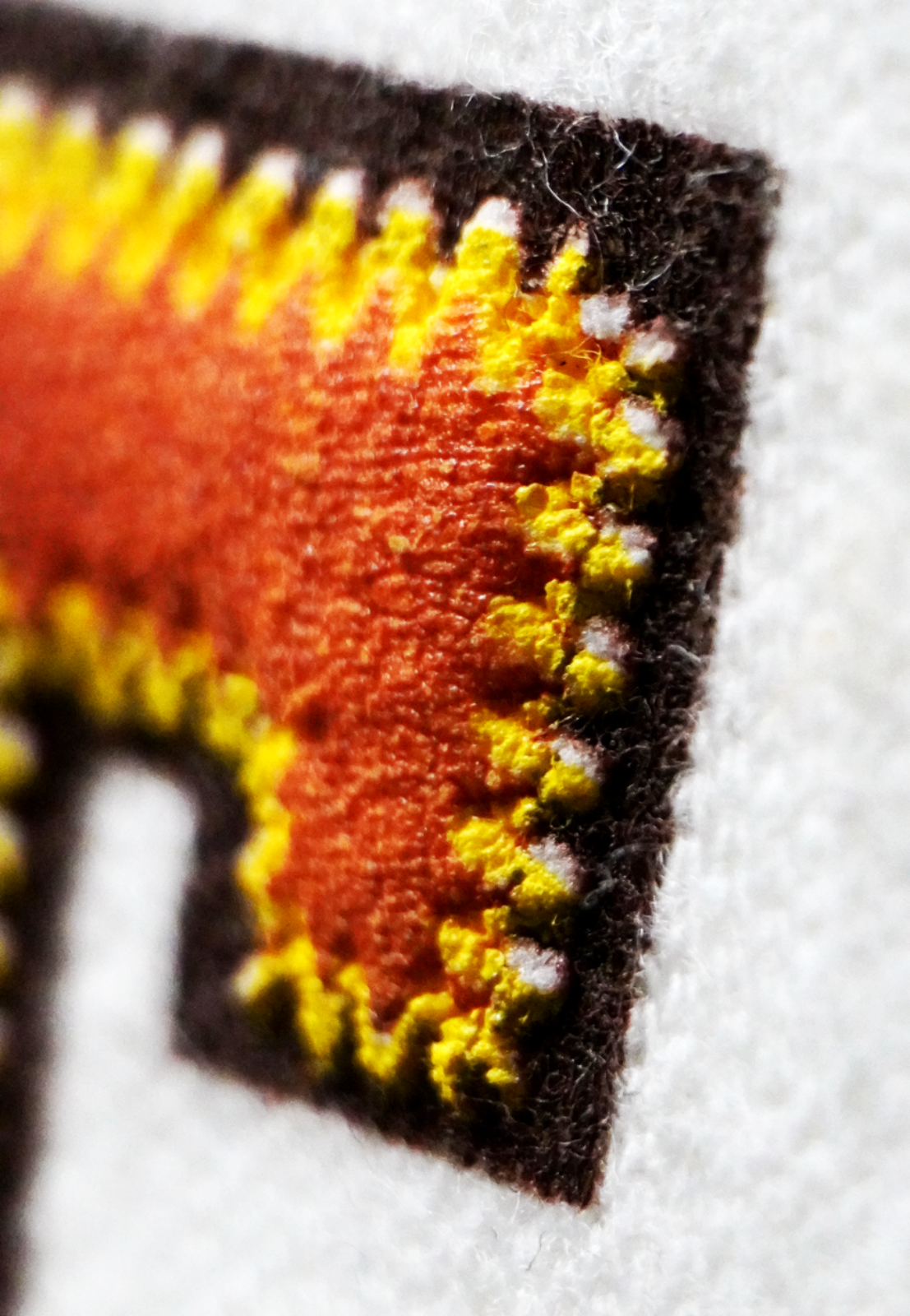 Puff Screenprint, Specialty Ink, Closeup of a Puff fake-embroidery screenprint