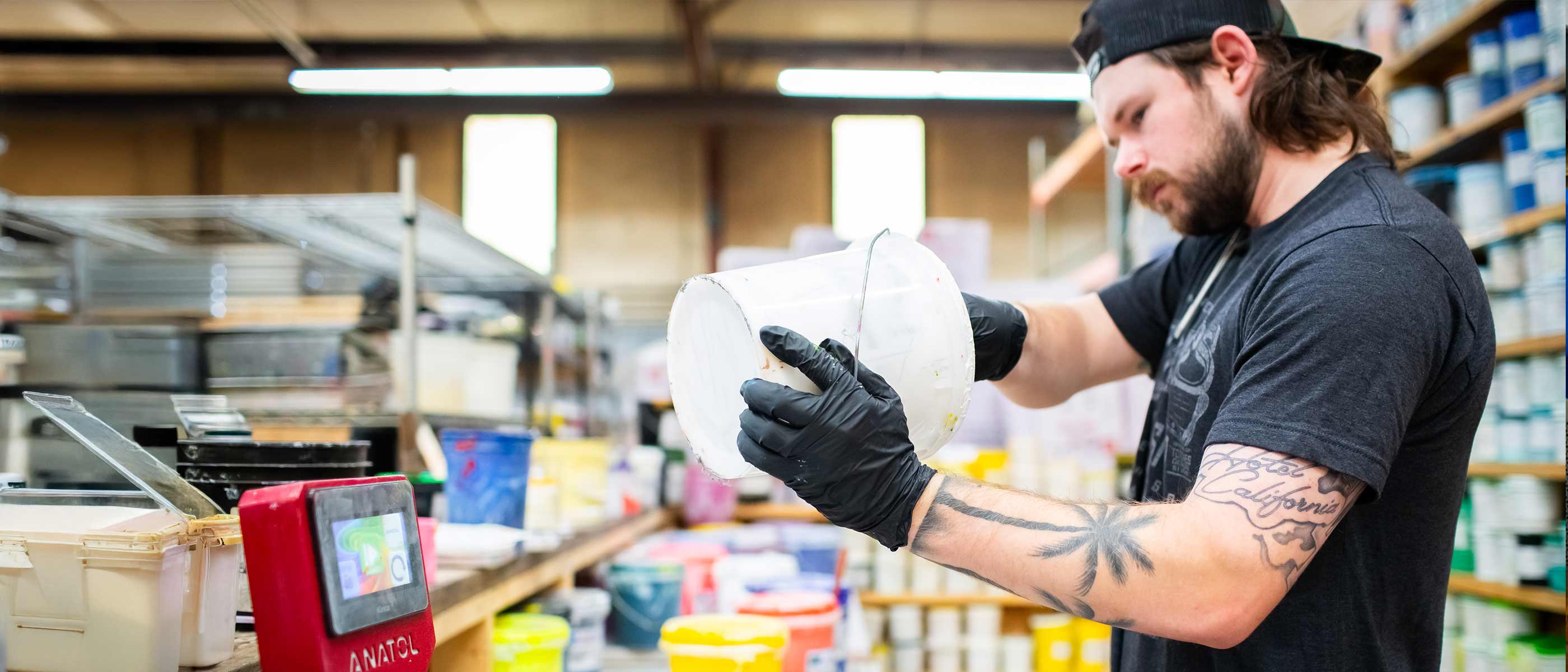 Ink mixing table inside the Torches design studio, prepping for PMS color match